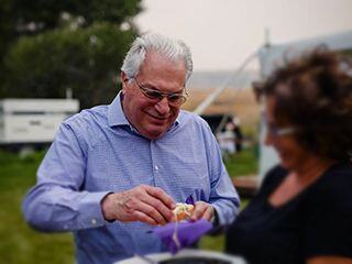 Steve K. holding a sandwich