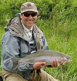 Van M. holding a fish